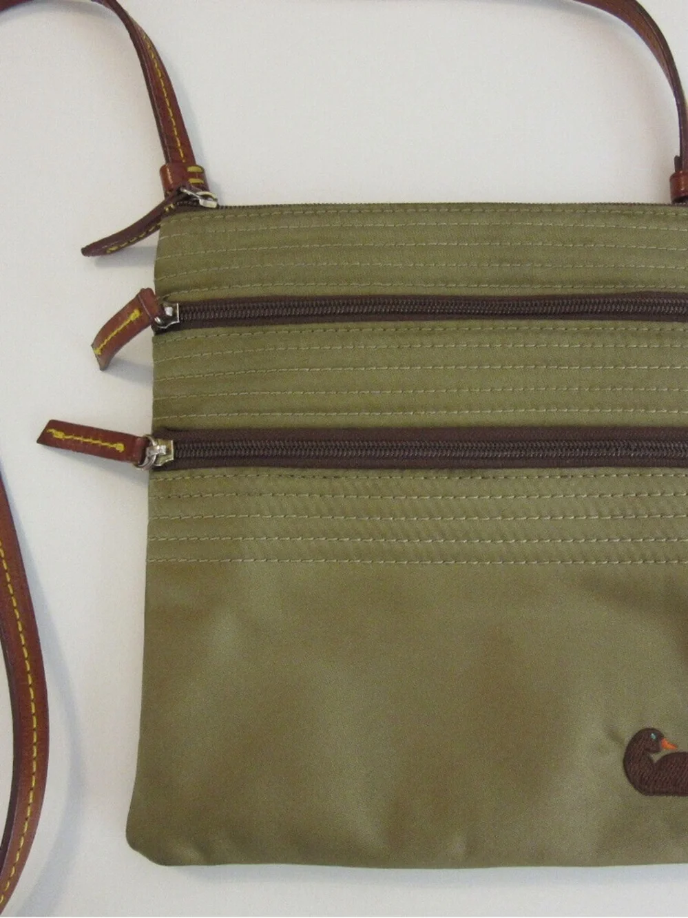 Olive Green Dooney & Bourke Crossbody  Bag with Brown Trim